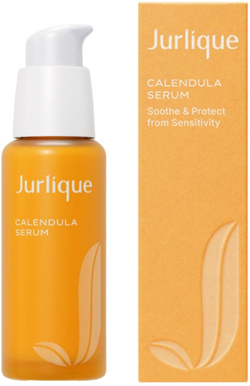 En gul flaske med hvit pumpe og matchende orange eske, merket Jurlique Calendula Serum for sensitiv hud.