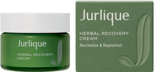 En grønn krukke merket Jurlique Herbal Recovery Cream ved siden av en matchende eske. Emballasjen er enkel og naturlig.