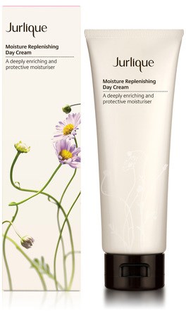 En tube med Jurlique Moisture Replenishing Day Cream med blomster på emballasjen.