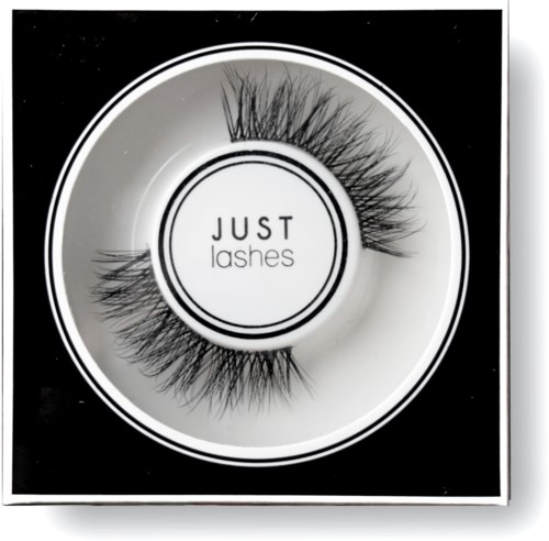 En rund bildskärm visar falska ögonfransar med texten "JUST lashes" i mitten.