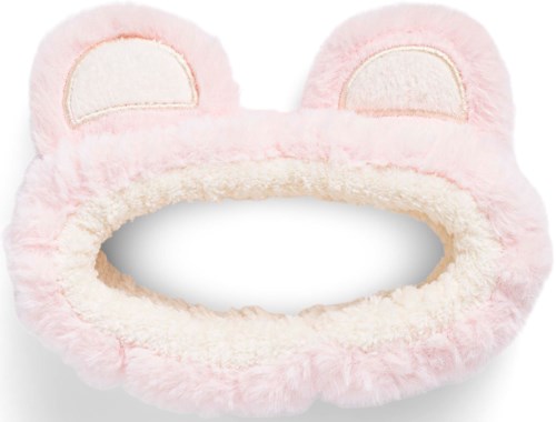 Mjuk rosa fluffy pannband med björnöron och broderade ögonlappar för ansiktsvård eller smink.
