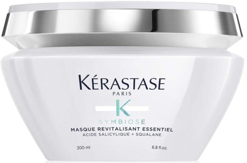 En vit burk med silverlock, märkt Kérastase Paris, innehåller en revitaliserande hårmask med salicylsyra och squalane.
