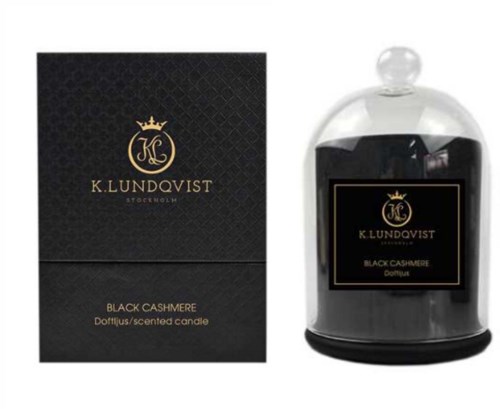En lyxig doftljus och låda med svart kassaskinnsdoft och elegant guldförgylld logotypdesign.