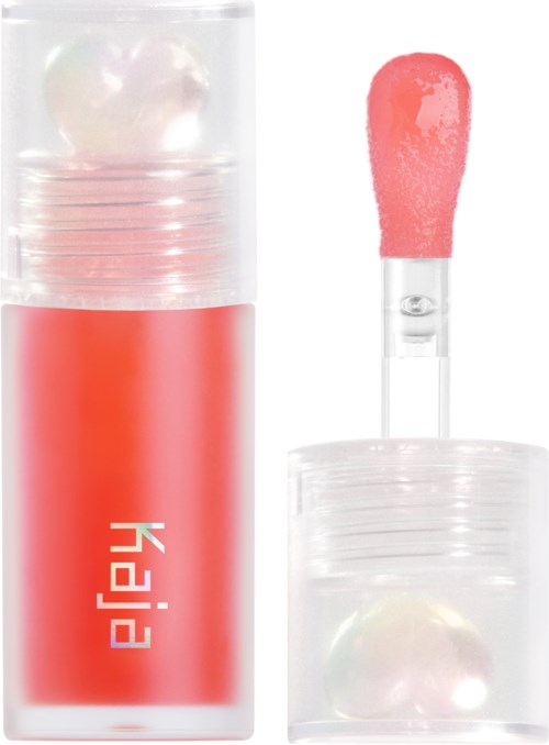 Lippen glänztube mit Schwammapplikator und Perle im Inneren.