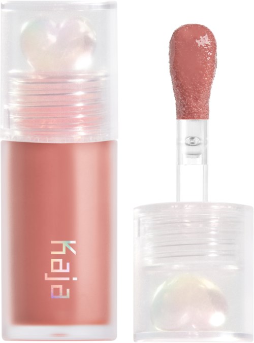 Lyserødt leppeglans med gjennomsiktig lokk og applikator. Applikatoren har rosa gloss på seg, og glossen er i et rør.