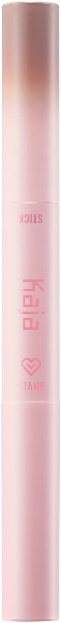 En lys rosa, sylinderformet sminkeprodukt med tekst i mørkere rosa.