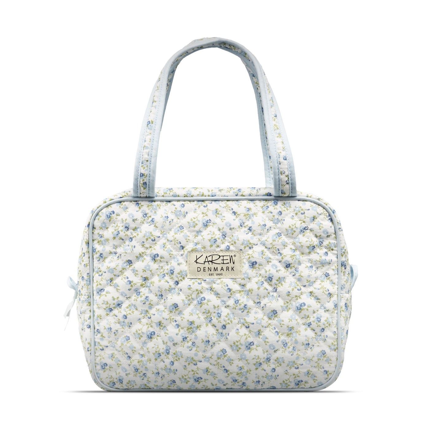 Läs mer om Karen Large toilet bag with handle in blue small flowered quilt.
