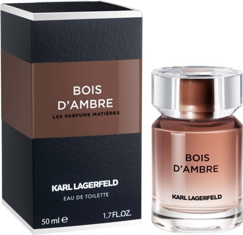 En doftflaska och förpackning i brunt och svart, märkta 'Bois d'Ambre' av Karl Lagerfeld.