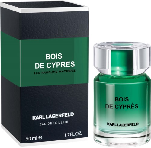 En parfymflaska och box i grönt och svart, märkt 'Bois de Cypres' av Karl Lagerfeld.