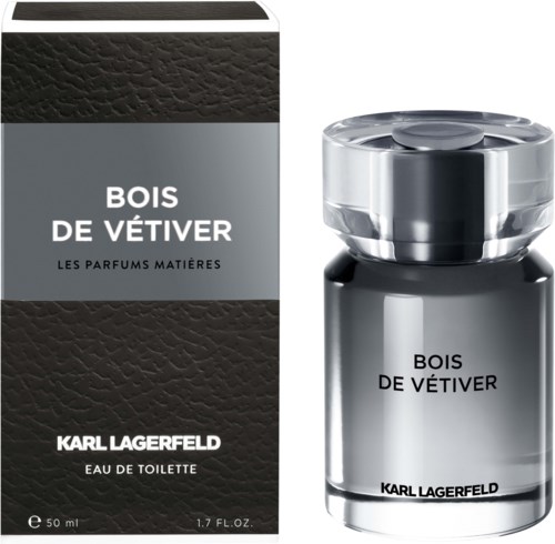 En parfymflaska och box märkt 'Bois de Vétiver' av Karl Lagerfeld, i huvudsak svarta, silver och grå färger.