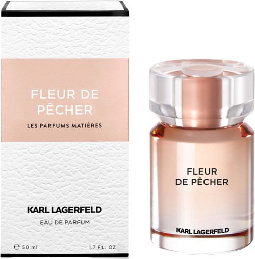 En parfymflaska och dess förpackning, båda heter Fleur de Pêcher, med mjuka rosa och vita färger och enkel text.