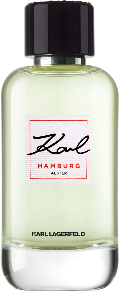 Eine klare Parfümflasche mit schwarzem Deckel, Beschriftung "Karl" und "Hamburg". Das Parfüm ist blassgelb.