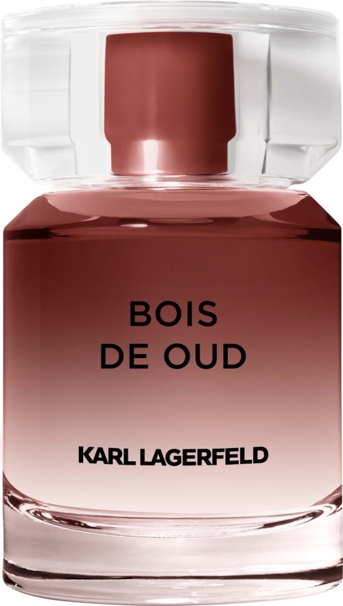 A perfume bottle with a pink gradient color and a clear glass cap, labeled Bois de Oud by Karl Lagerfeld.