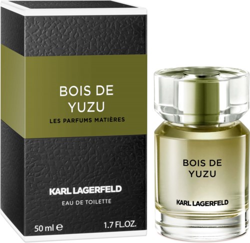 En svart och grön box med vit och gul text, inklusive en parfymflaska märkt 'Bois de Yuzu' av Karl Lagerfeld.