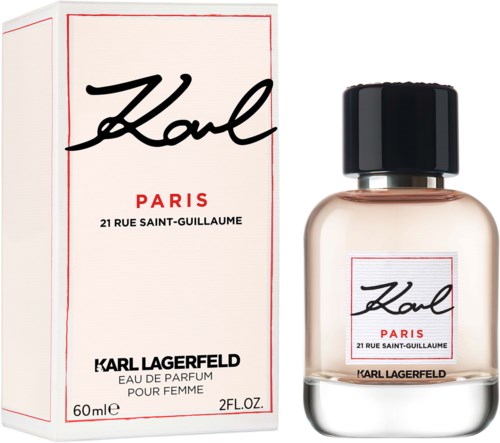 A perfume bottle and box with Logo, Paris address, and brand name Karl Lagerfeld, in black and white with a pinkish tint.