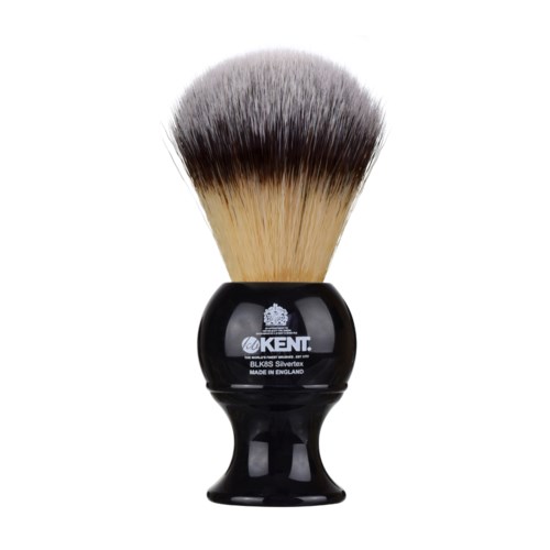 A shaving brush with black handle, dense bristles, and a logo on the handle.