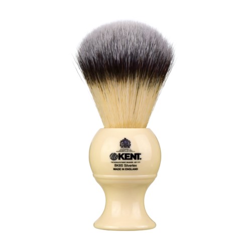 A shaving brush with a cream handle and dense bristles, used for applying shaving foam or cream.