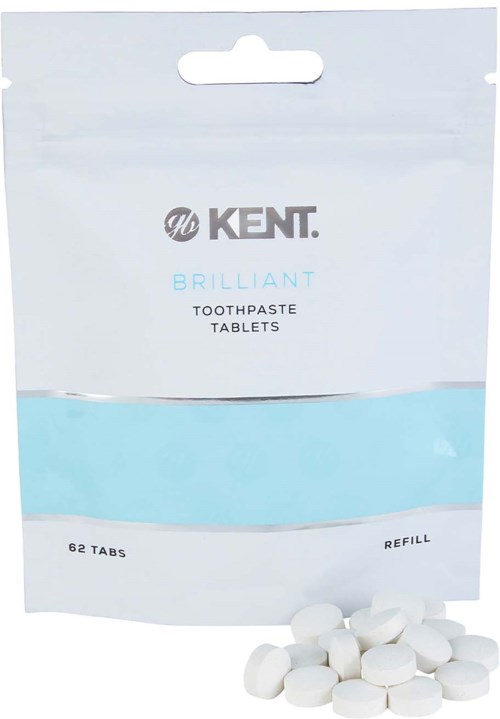 A pack of Kent Brilliant toothpaste tablets with some tablets outside, labeled for refilling. 20 words.
