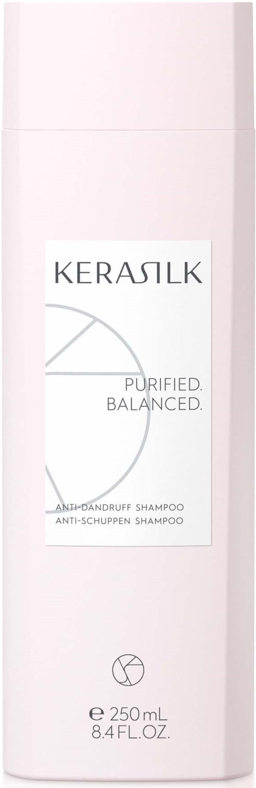 En lång, vit schampoflaska med etikett som läser Kerasilk, Purified, Balanced och anti-tandkräm. Den rymmer 250 ml.