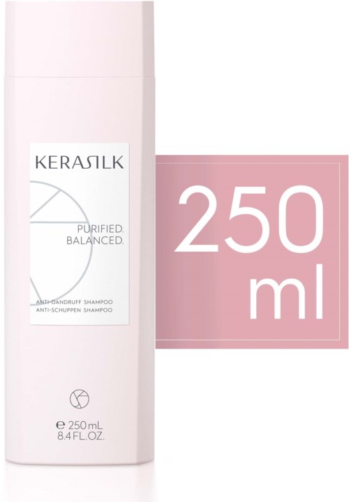 En vit flaska med Kerasilk-schampo med en rosa etikett som visar 250 ml volym.
