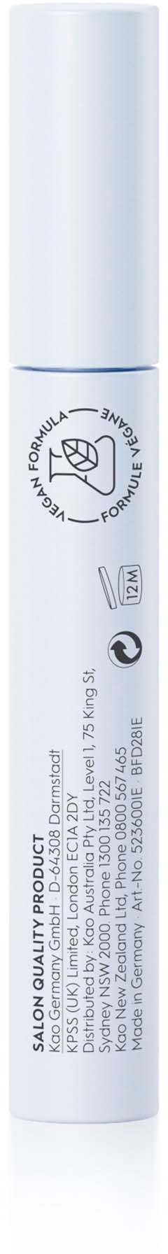 Een witte penvormige container met labels en iconen, gebruikt voor make-up of cosmetica. Het heeft een dop aan de bovenkant.