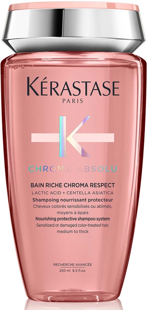 A pink shampoo bottle with a silver cap, labeled "Kérastase Paris" and "Chroma Absolu."