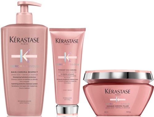 Tre rosa hår- och ansiktsprodukter från Kérastase, inklusive schampo, mask och leave-in-behandling.