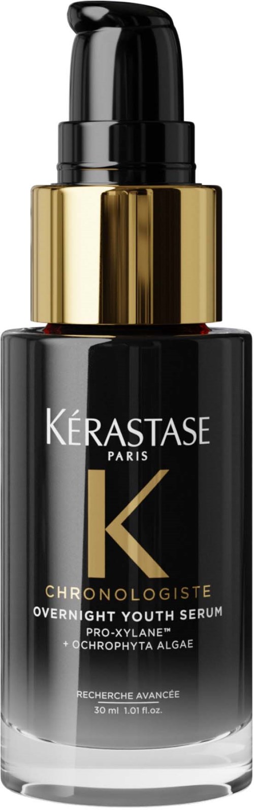 Mustan ja kullanvärisen pulloon Kérastase Paris -seerumi, jossa pumpun hienovarainen annostelija.