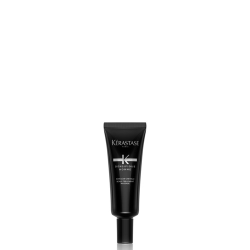 En svart tube med hårpleieprodukt fra Kerastase med hvit merking og tekst.
