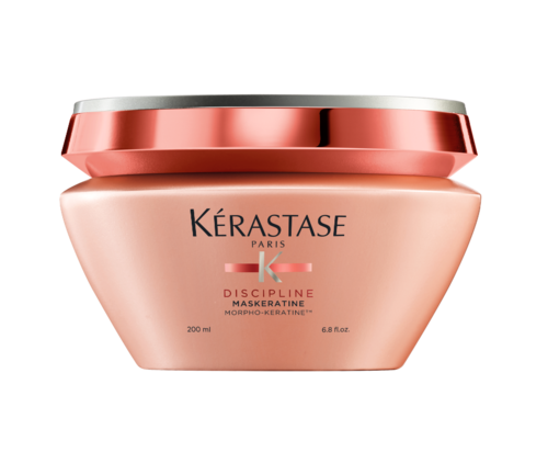 En krukke med Kérastase Discipline Maskeratine hårkur med rosa lokk og etikett.