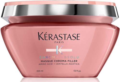 Pink jar of Kérastase Chroma Absolu hair mask with silver lid.
