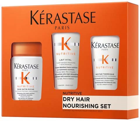 En shampoo, balsam og hårbehandling for tørt hår i orange emballage med mærket Kerastase.