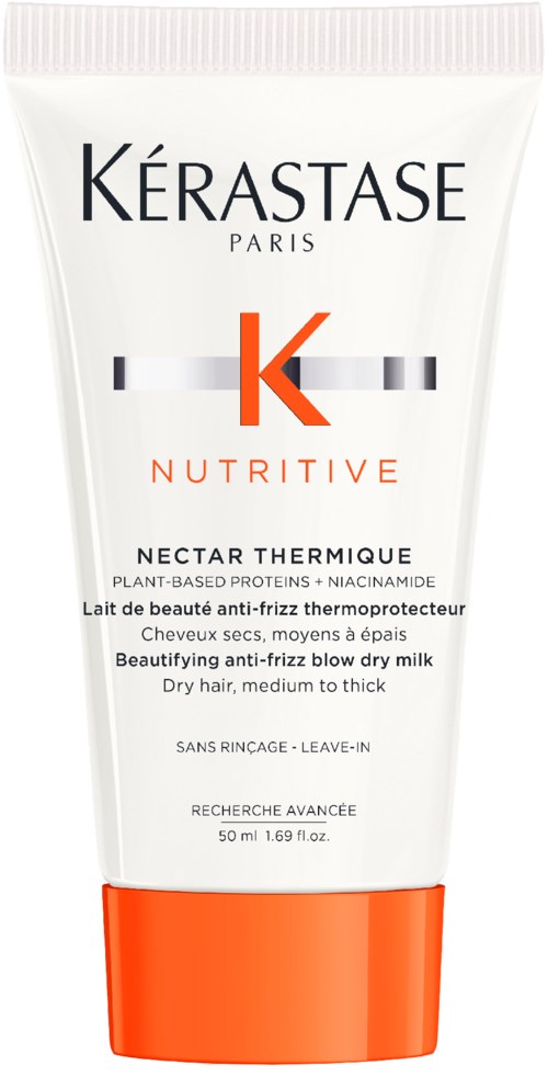 En vit tub av Kérastase Nutritive Nectar Thermique hårprodukt med orange lock och svart text.