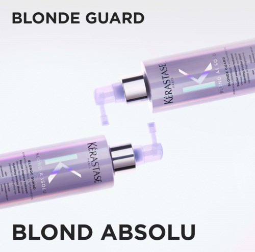 Two bottles of Kerastase Blond Absolu products with purple caps and labels, and text indicating "Blonde Guard".
