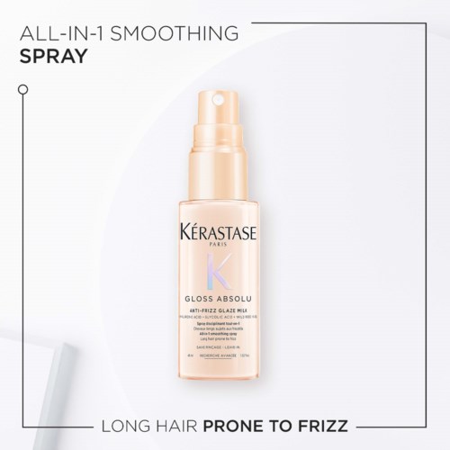 A hair spray bottle labeled Kérastase, described as smoothing and anti-frizz, for long hair prone to frizz.