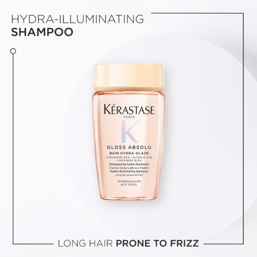 En schampoflaska märkt Hydra-Illuminating, för långt hår som är benäget för friss, med beige lock och rosaaktig kropp.