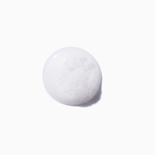 Een wit, rond voorwerp met een getextureerd oppervlak dat lijkt op de maan. Het heeft schaduwen en hoogtepunten.