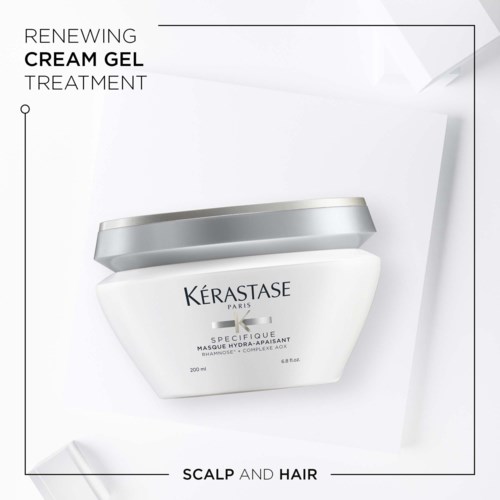 A jar of Kérastase hair treatment gel with a silver lid, shown on a white background.