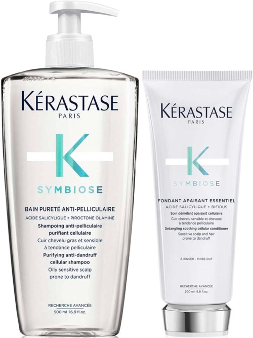 Two skincare products from Kérastase, one in a clear bottle with a pump and another in a white tube.