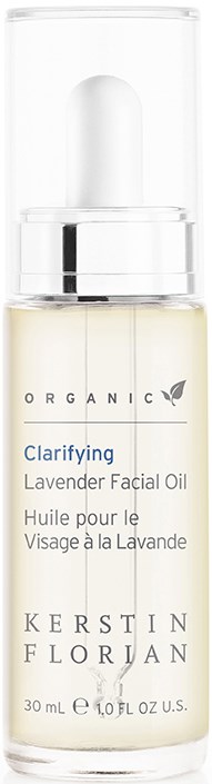 En liten klar flaske med hvit væske, merket som lavendel ansiktsolje av Kerstin Florian, sier organisk og avklarende.