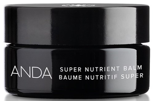 A black jar labeled 'ANDA Super Nutrient Balm' with simple text, shiny lid, and clean design.