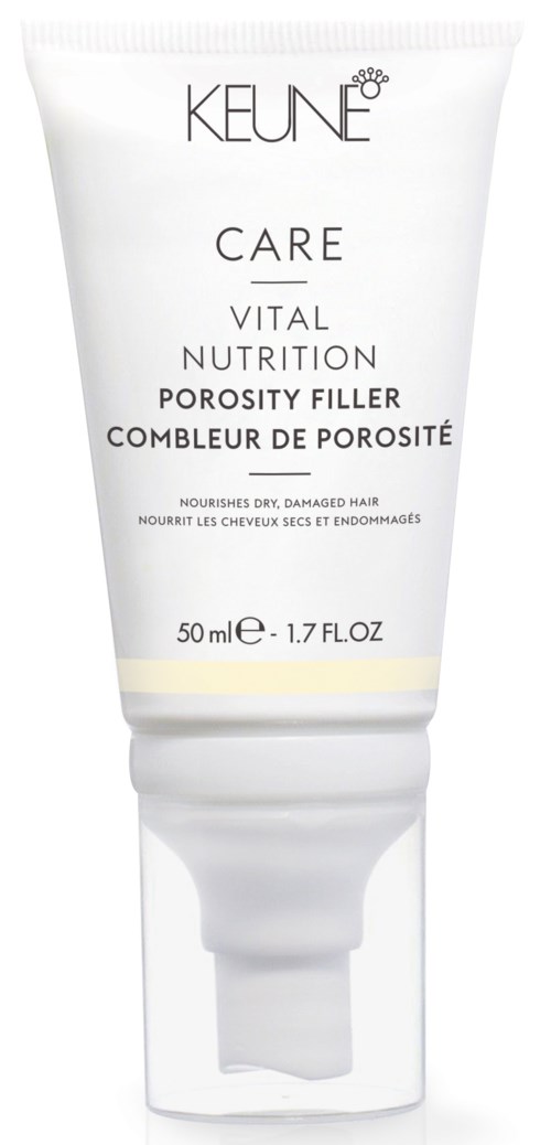 En vit tub av Keune hårprodukt för torrt, skadat hår med vit lock och gul rand.