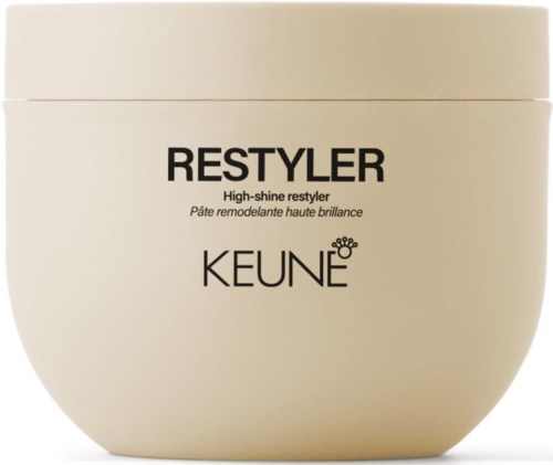 En beige beholder med hårstilprodukter merket 'RESTYLER' av KEUNE, for høyglistret hårfinish.