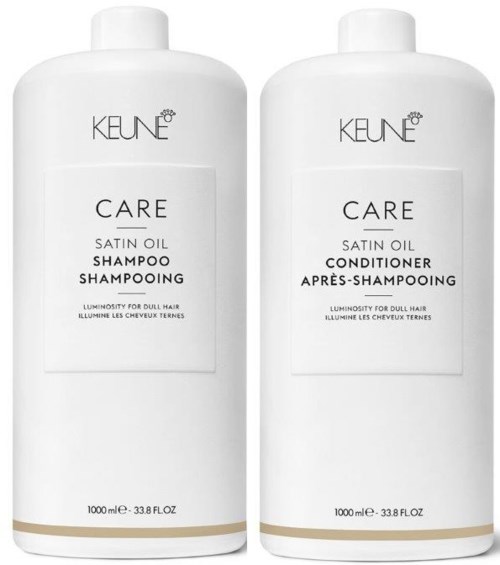 Två vita flaskor av KEUNE CARE Satin Oil Schampo och Balsam för trött hår.