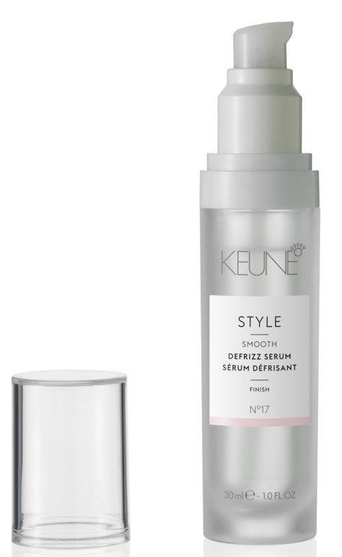 A white pump bottle with a clear cap, labeled KEUNE STYLE, additional text on the front about serum and finish.