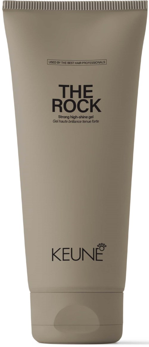 En beig tub med svart text, märkt "THE ROCK" och "KEUNE," troligen en hår- eller hudvårdsprodukt.