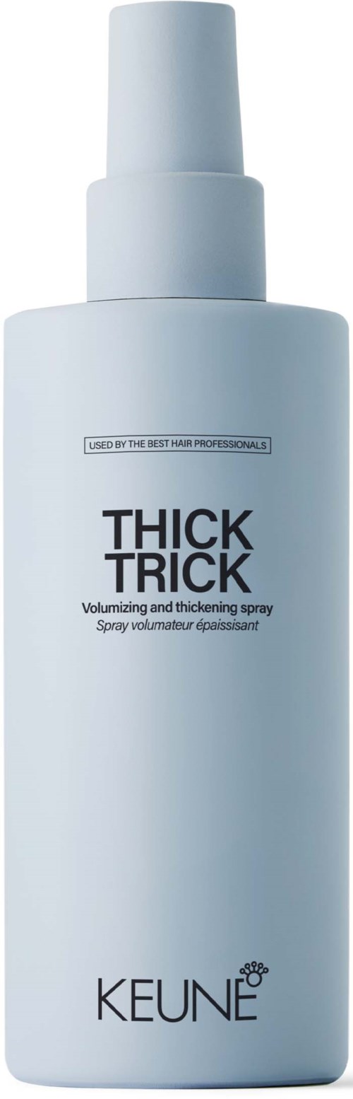 A white spray bottle labeled "THICK TRICK" by KEUNE, designed for volumizing and thickening hair.