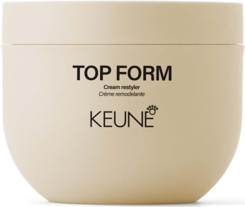 En ljuskrämfärgad burk med svart text märkta 'Top Form' och 'Keune'.