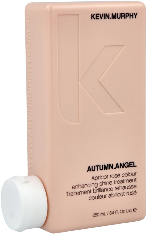 En rosa flaska med svart text, märkt Kevin Murphy Autumn Angel, som beskriver det som en aprikos rosfärg behandling.