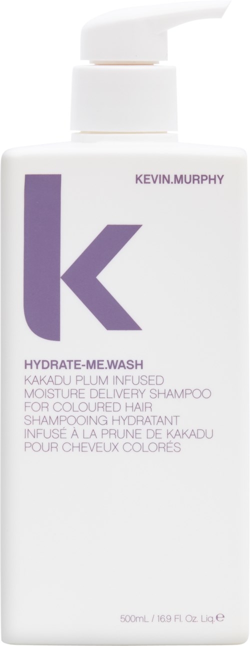 A white shampoo bottle with a purple "k" logo and text for Kevin Murphy Hydrate-Me.Wash.